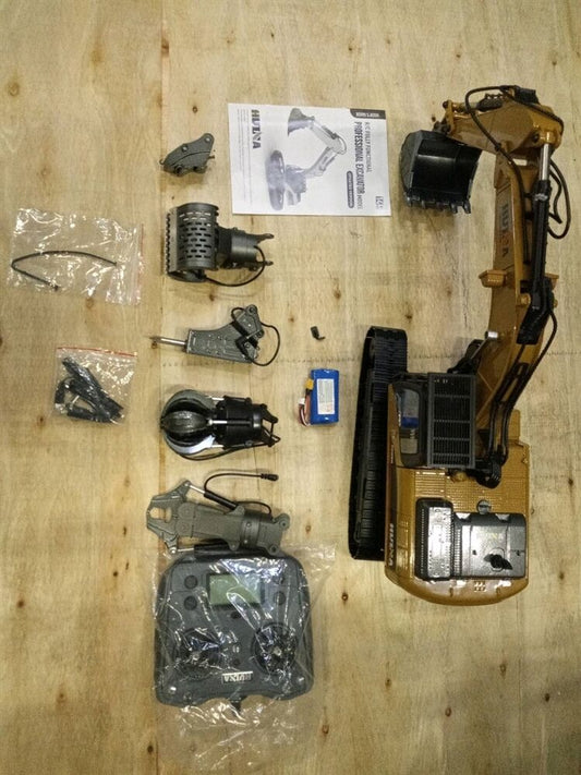 Second Hand Fast Shipping HUINA New Upgrade 580 1/14 Metal Excavator Model Engineering Vehicle Electric Ball Grabber 360 Rotating Shear Claw Sound Lights