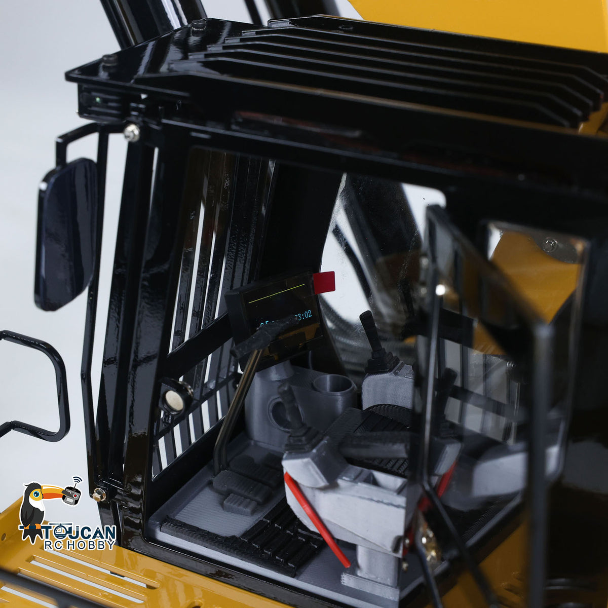 TOUCAN 6015B 1/14 Metal Hydraulic RC Excavator cab interior with realistic controls