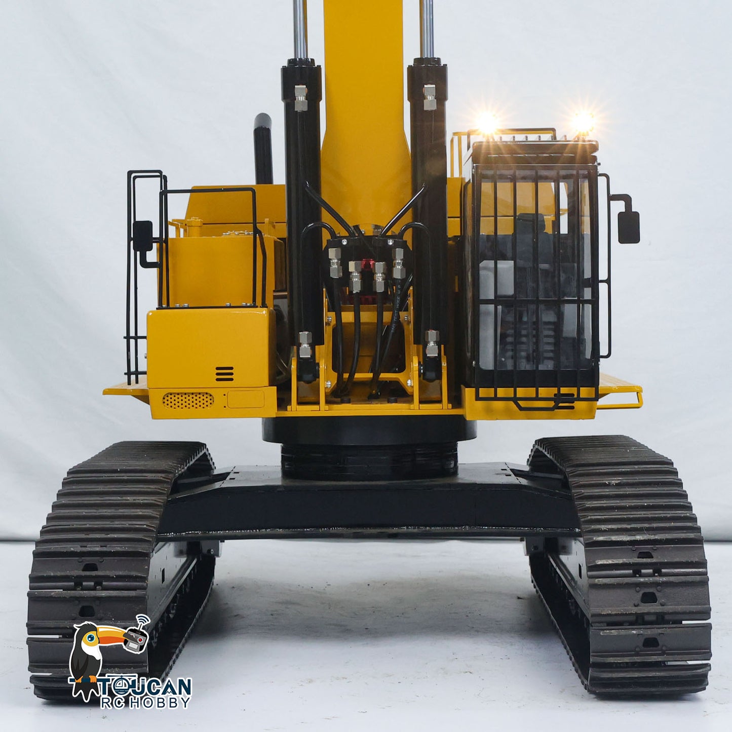 TYMX 390F 1/8 Metal Hydraulic RC Excavator Heavy Duty Digger front view with detailed cab and boom