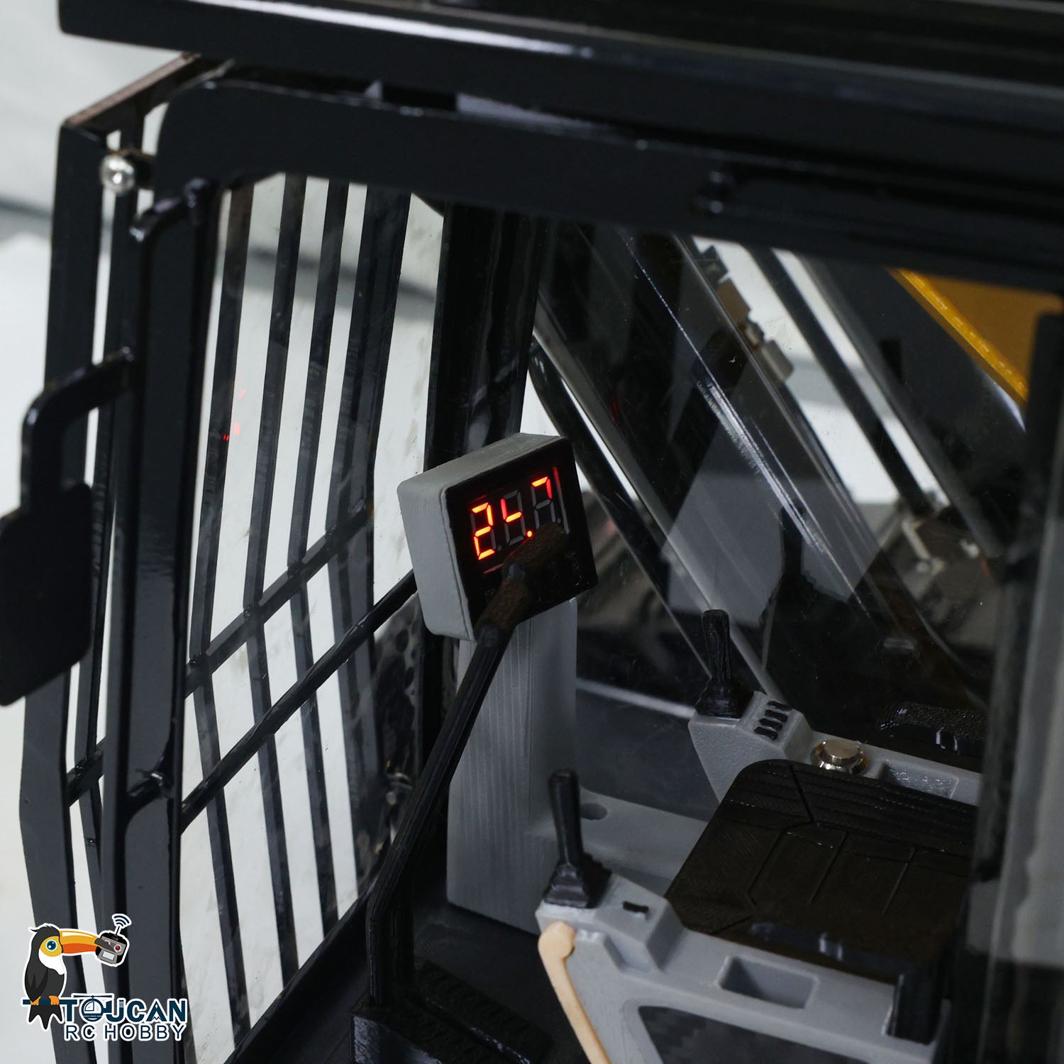 TYMX 390F 1/8 Metal Hydraulic RC Excavator Heavy Duty Digger cab interior with detailed controls